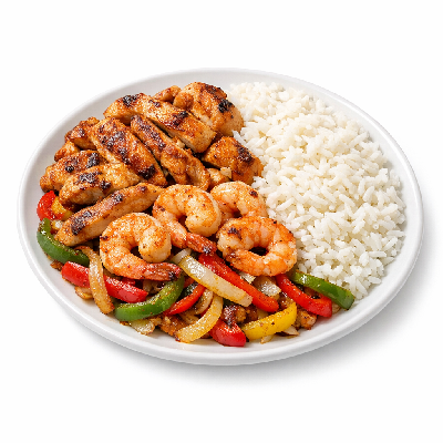 https://eato.health/food-images/feast/act/applebee-s-sizzling-entrees-skillet-fajitas-with-rice-chicken-and-shrimp-14387313-1.webp