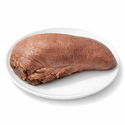 Beef variety meats and by-products tongue cooked simmered