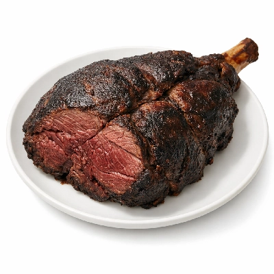 Caribou hind quarter meat cooked by Alaska Native