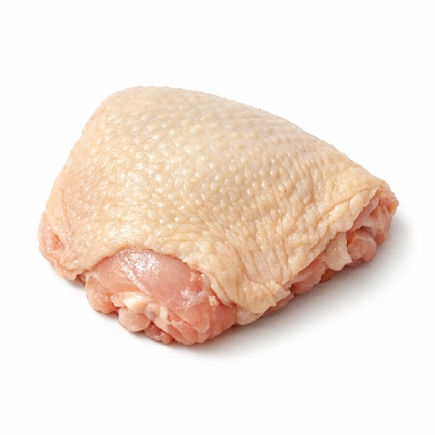 Chicken dark meat thigh and skin enhanced raw