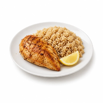 Food 4 Fitness Oven Roasted Chicken Breast with Salt Pepper Lemon Wedge Brown Rice 350g