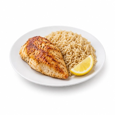 Food 4 Fitness Oven Roasted Chicken Breast with Salt Pepper Lemon Wedge Brown Rice 450g