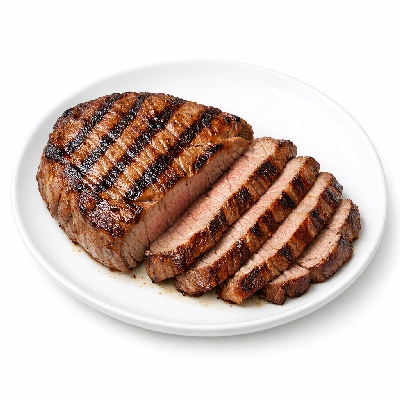 Lamb veal & game leg top round cap off cutlet boneless cooked grilled