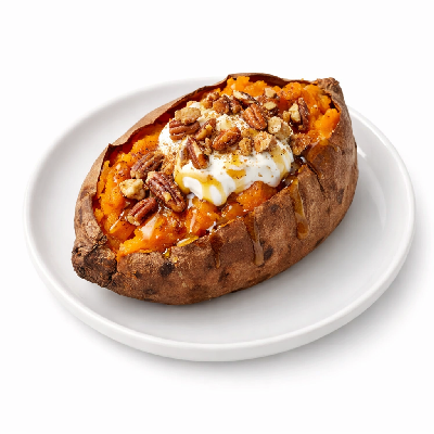 https://eato.health/food-images/feast/act/outback-steakhouse-sides-sweet-potato-includes-all-toppings--19102902-1.webp