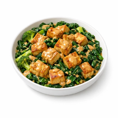 Skillet Tofu with Greens and Peanut Sauce