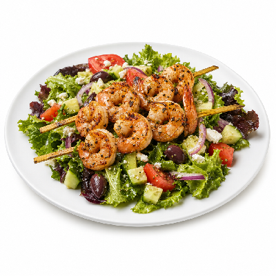 Taziki's Mediterranean Salad with Shrimp Kebabs and Greek Dressing.