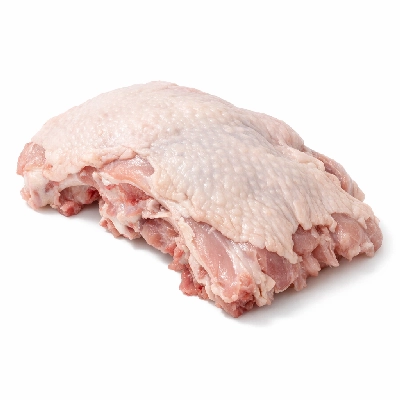 Turkey fryer-roasters back meat and skin raw