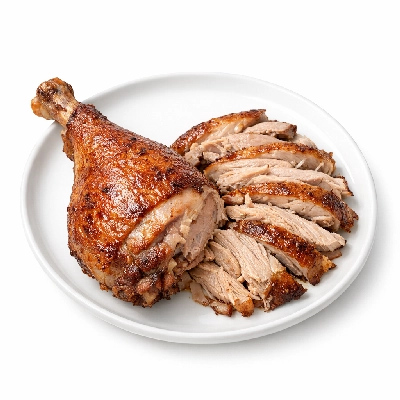 Turkey fryer-roasters leg meat and skin cooked roasted