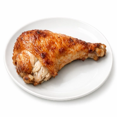 Turkey young tom wing meat and skin cooked roasted