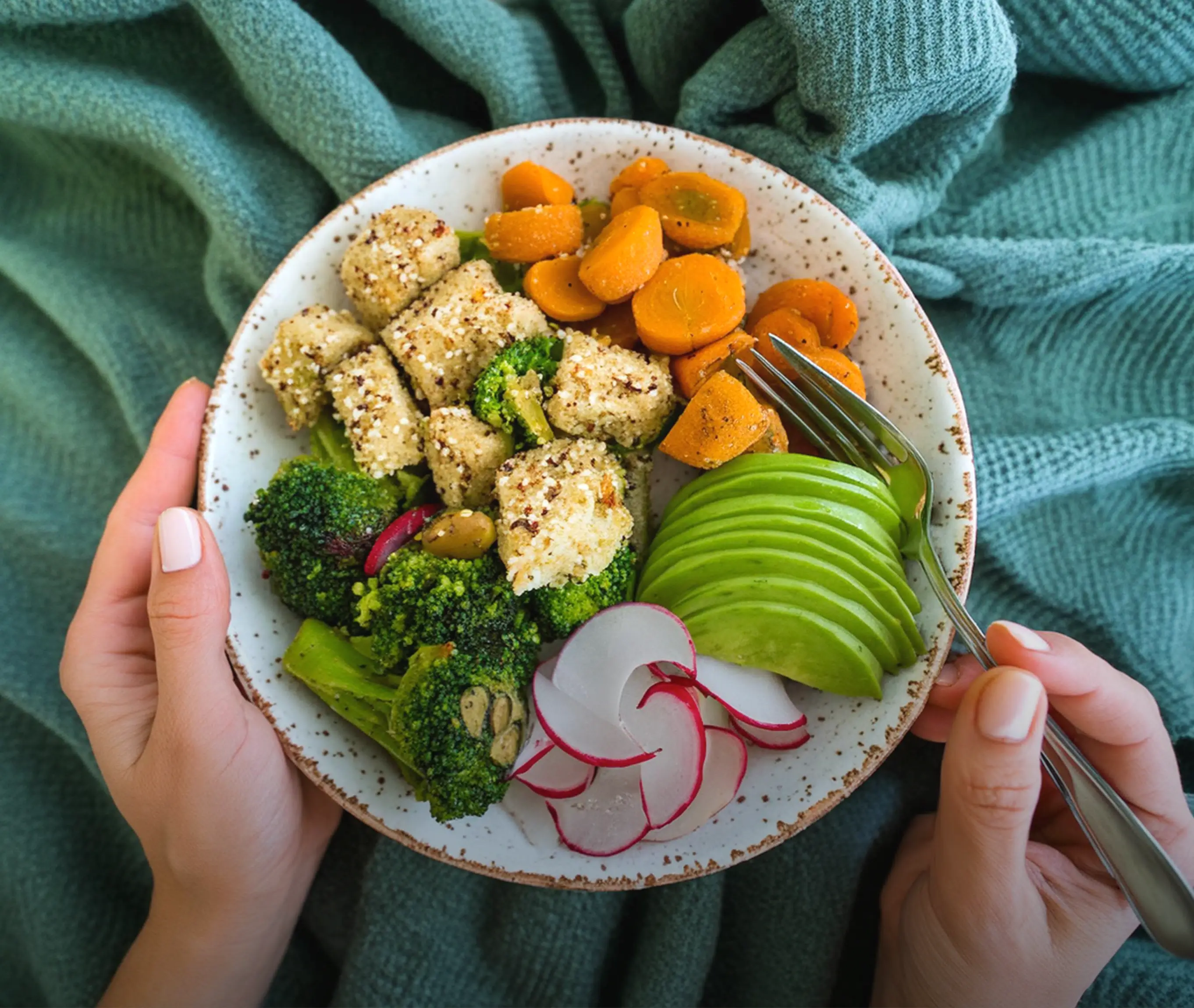 A plate of fresh vegetables that can be logged as a meal in the app