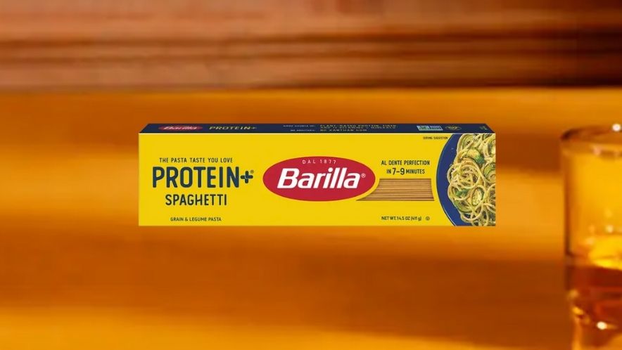 Barilla Protein Plus spaghetti box featuring high protein low carb pasta made with grains and legumes for balanced nutrition.
