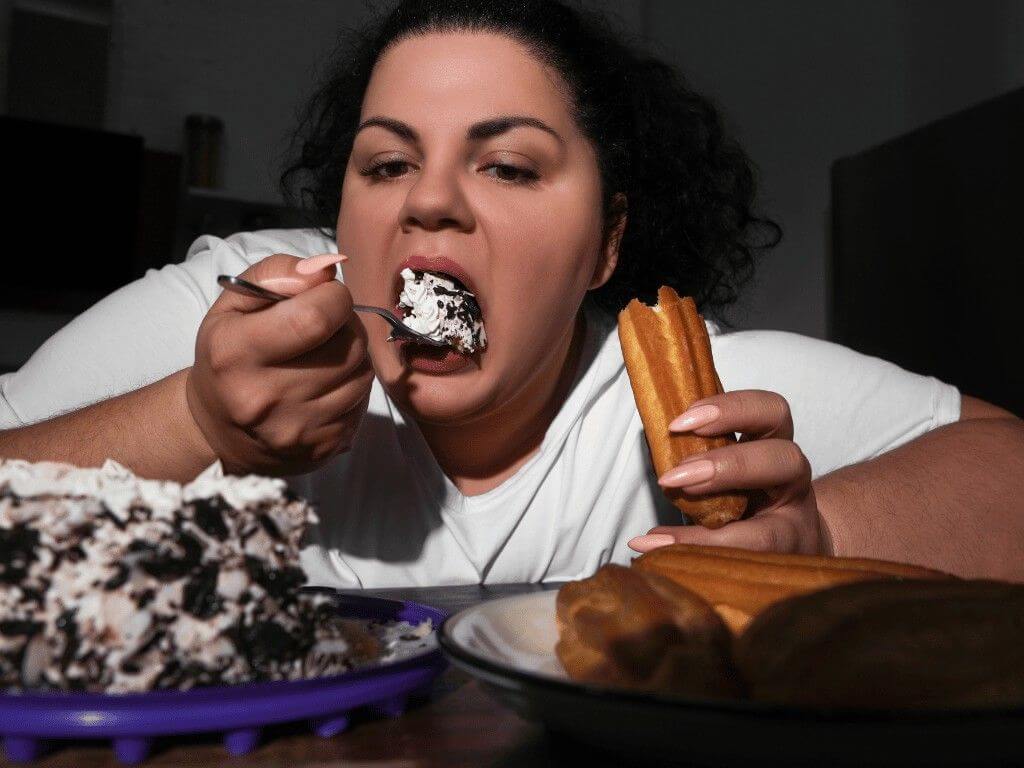 Episodes of uncontrolled eating and emotional distress from binge eating disorder.
