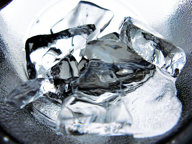 Close up of melting ice cubes used in the ice water hack, a cold exposure method that boosts metabolism and helps support weight loss.