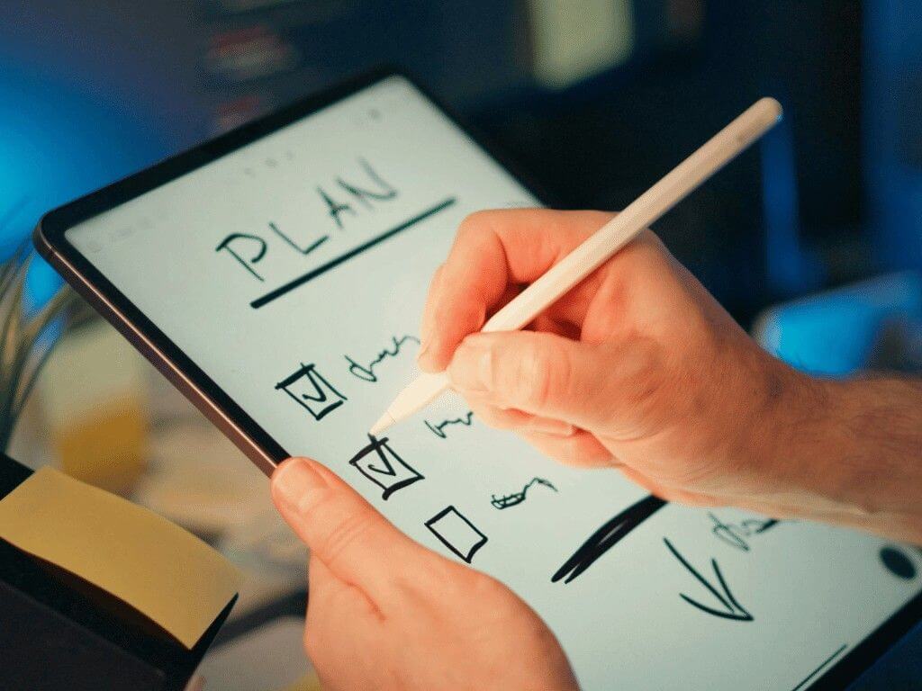 meal plan checklist on tablet to organize a 7 day low sodium diet plan.
