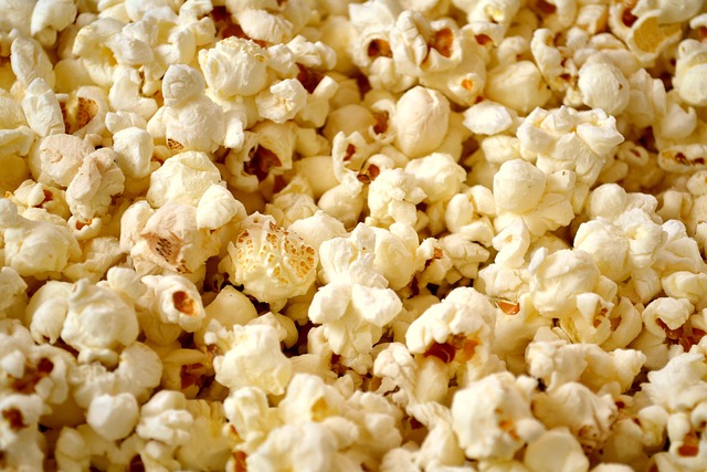 Air-popped popcorn is a light gluten-free snack for kids when made without flavored coatings.