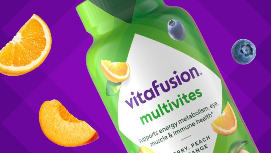 Vitafusion Adult Gummy Vitamins bottles with immune and bone health support.