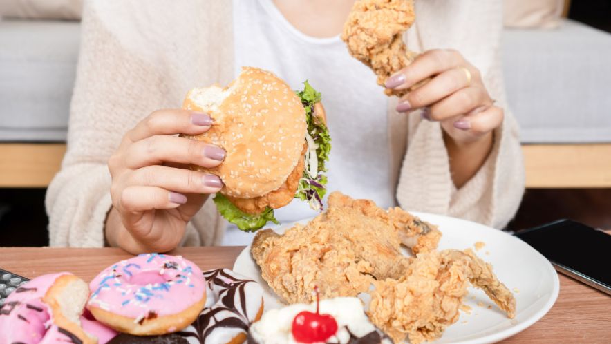 A girl who is binge eating